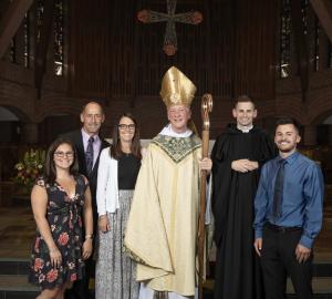 Bro Aloysius and his family with Abbot Mark