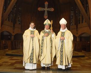 Left to right: Father Aloysius, Bishop Libasci, Abbot Mark